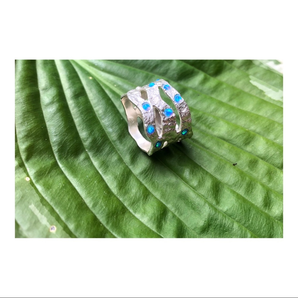 Sterling silver ring with man-made opal